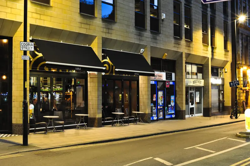 Dual Black Sun Awnings in Manchester Cafe Bar Shop Front